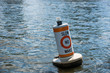 A no wake zone buoy in a river