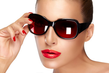 Wall Mural - Beautiful Model in Black Fashion Sunglasses. Makeup and Manicure