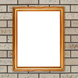 blank wood frame on brick stone wall