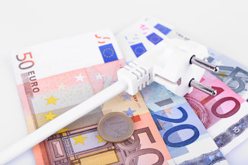 Sticker - Cord with plug on euro banknotes background