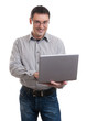 © spaxiax - Happy man holding laptop