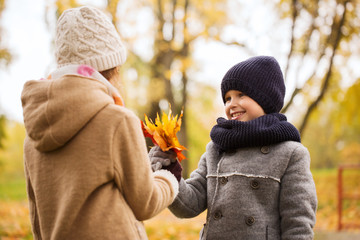 Sticker - smiling children in autumn park