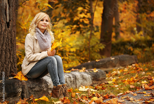 Autumn Woman. Fall. Blonde Beautiful Girl with Yellow Leaves Stock ...