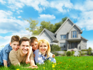 Wall Mural - Happy family near new home.