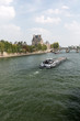 Paris - the barge  swimming with Seine toward the Royal Bridge