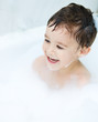 © julaszka - Child bathes in a bathroom