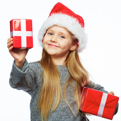 Smiling girl hold christmas gifts.  Isolated portrait