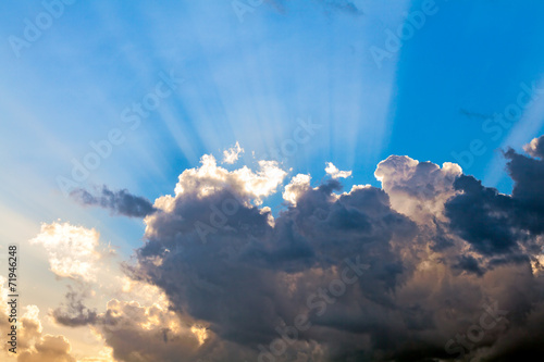 Obraz w ramie Clouds In The Blue Sky and Sun Rays