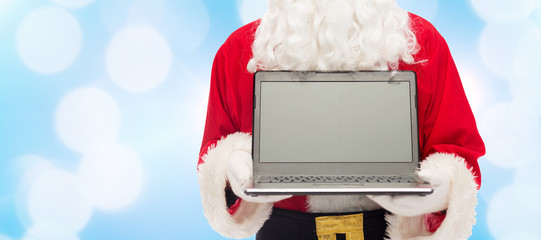 Poster - close up of santa claus with laptop