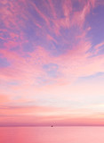 Fototapeta Zachód słońca - Bright Colorful Sunrise On The Sea With Beautiful Clouds