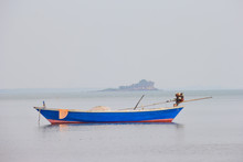 Blue Fishing Boat On Sea