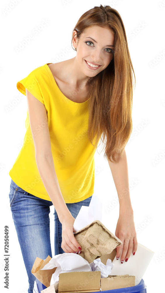 Young girl sorting paper and cardboard isolated on white