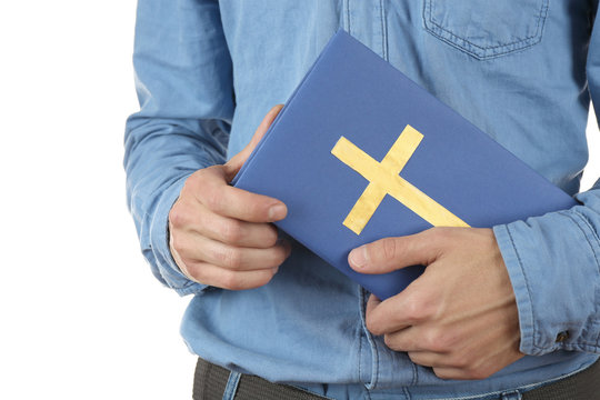 Man holding Bible close up