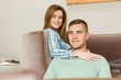 © WavebreakMediaMicro - Cute couple relaxing on couch