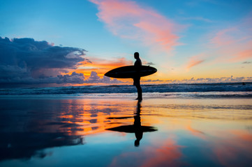 Surfer with board