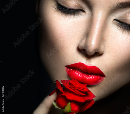 Obraz w ramie Beautiful sexy woman with red lips, nails and rose flower