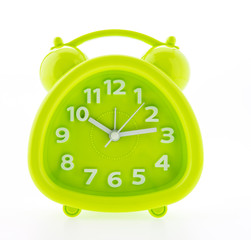 Green alarm clock isolated on white background