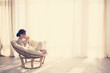 © Alena Ozerova - Woman relaxing in chair
