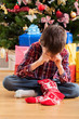 Boy dissatisfied with christmas present