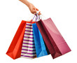 © monticellllo - Female hand holding paper shopping bags isolated on white