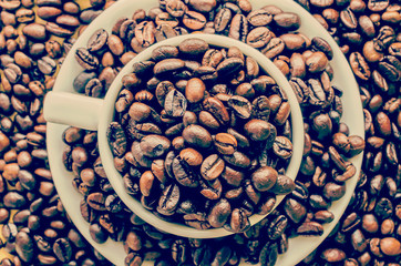 Wall Mural - Coffee beans on cup