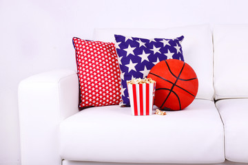 Sticker - Popcorn and basketball on sofa in room