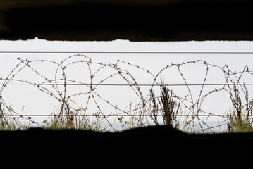 Barbed wires on Omaha beach. Omaha beach is located on the coast