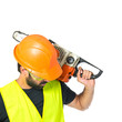 © luismolinero - Workman with chainsaw over white background
