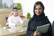 © Ramzi - Arabian Businesswoman with her boss on Background