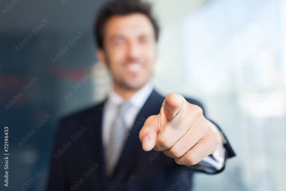 Businessman pointing his finger at you - obrazy, fototapety, plakaty 