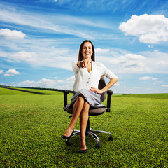 Wall Mural - woman sitting on the office chair