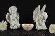 Christmas Angels with candle isolated on black, fot gifts