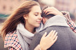 © Kalim - Woman hugging a man