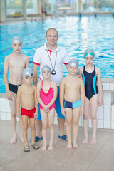 Canvas Print - children group  at swimming pool