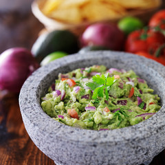 Wall Mural - mexican guacamole in stone molcajete