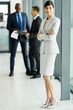 © michaeljung - indian businesswoman standing in office