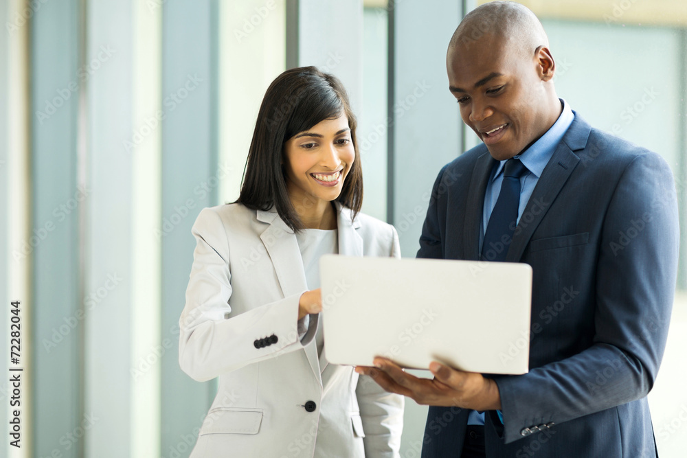 Colleague Computer young colleagues using laptop computer Stock Photo | Adobe Stock
