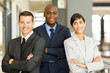 © michaeljung - afro american businessman with co-workers