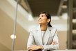 © michaeljung - indian businesswoman looking up