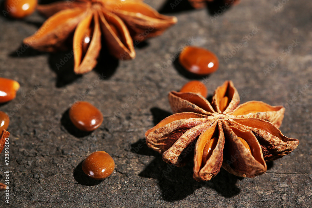 Stars anise on wooden background