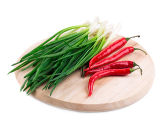 Wall Mural - Bunch of green onion with red pepper.