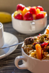 Wall Mural - Fresh fruit and oatmeal with healthy toppings for breakfast