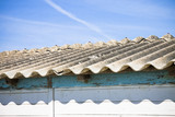 Fototapeta  - Dangerous asbestos roof - Medical studies have shown that the as