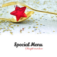 Christmas golden cutlery and  on festive background