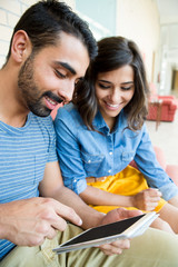 Couple using tablet