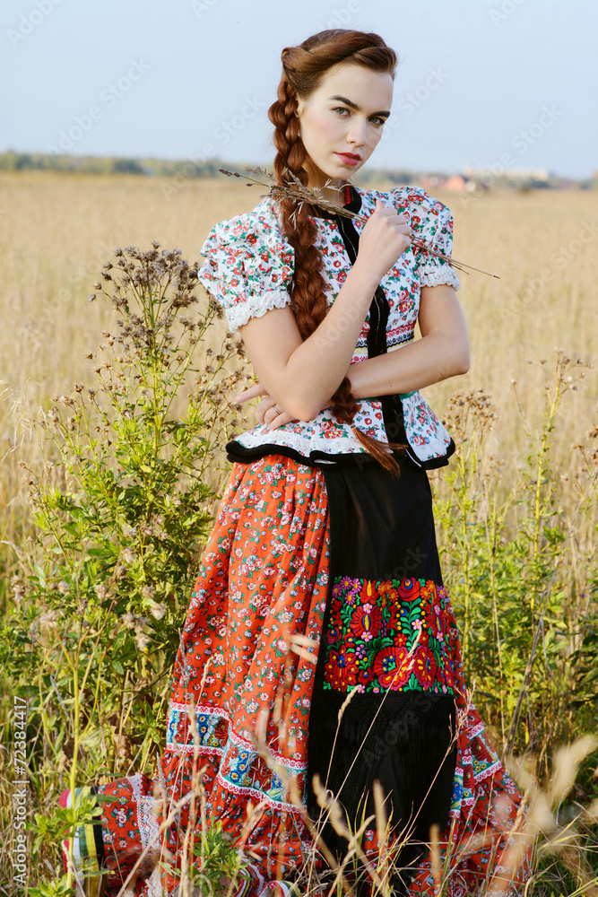 Young peasant woman, dressed in Hungarian national costume Stock Photo | Adobe Stock Young peasant woman, dressed in Hungarian national costume Stock Photo | Adobe Stock