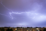 Fototapeta Tęcza - Storm with some lightning strike in the sky