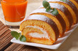 © FomaA - Tasty dessert of pumpkin roll with cream closeup