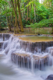 Fototapeta Las - Waterfall in deep rain forest jungle (Huay Mae Kamin Waterfall i