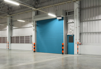 Wall Mural - Roller door or roller shutter. Also called security door or security shutter with automatic system. For protection industrial building i.e. factory, warehouse, hangar, workshop, store, hall or garage.